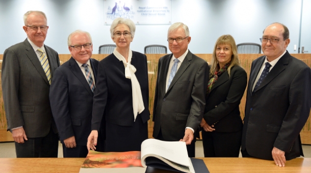 Commissioners with the Message to Australia book