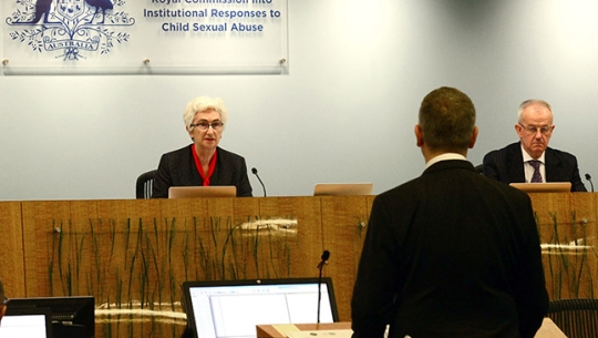 Counsel Assisting, Simeon Beckett addresses Commissioners Commissioners Justice Coate and Commissioner Atkinson