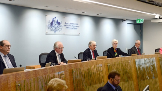 The full bench of Commissioners sitting and listening to Counsel Assisting Gail Furness SC