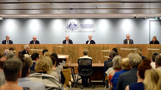 Commissioners in hearing room